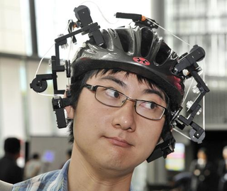 Illustration for article titled FreakBots, Ear-Pulling Helmets And Anti-Monster Bad-Breath Guns: Japan's Latest Weird Inventions